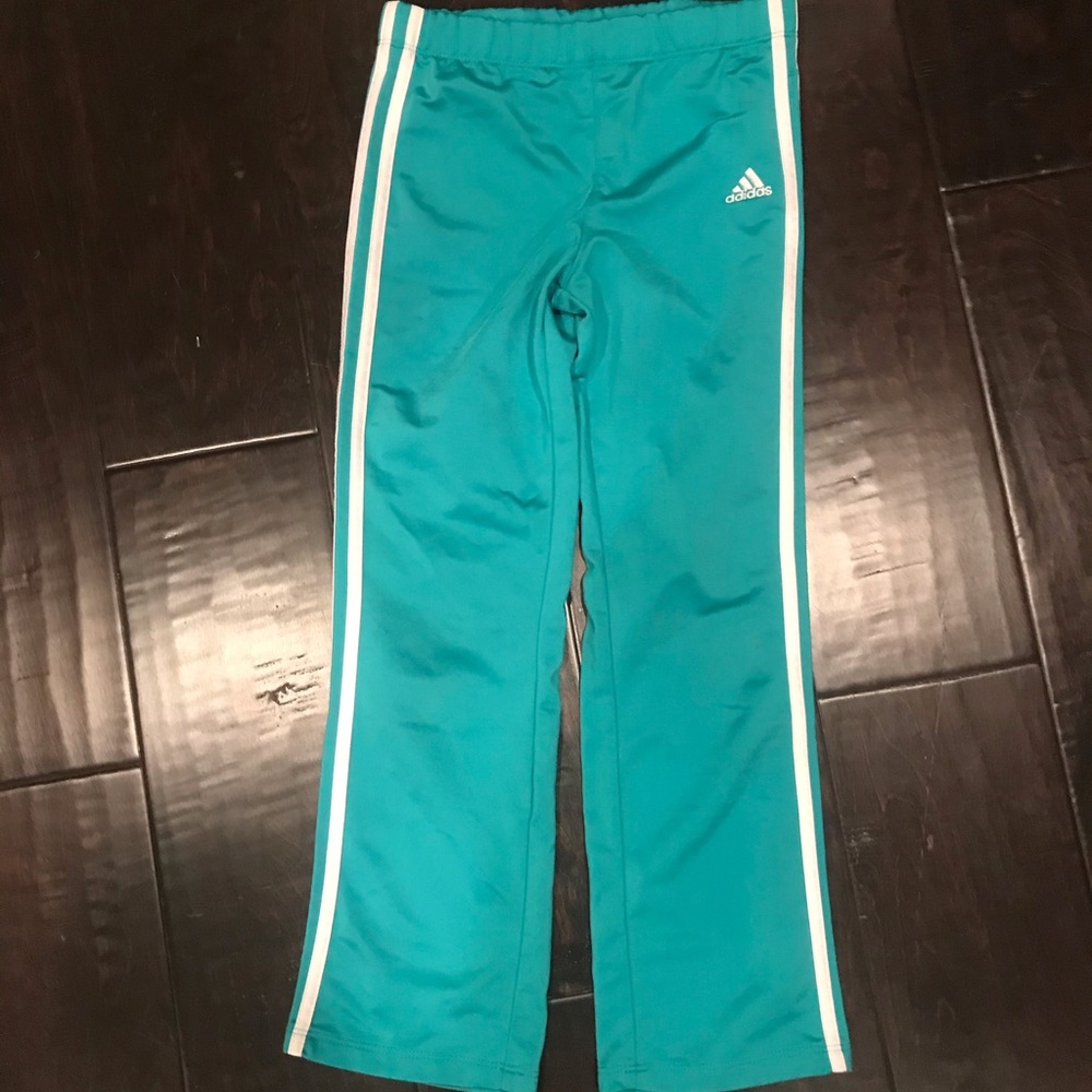 - Turquoise Adidas sweatpants